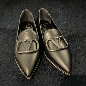 Beautiful black leather Valentino Garavani flats with V logo.  Size 36
